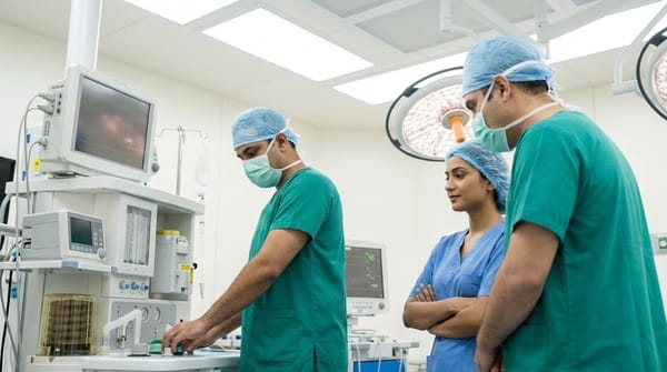 ICU nurse shadowing a Certified Registered Nurse Anesthetist in the operating room